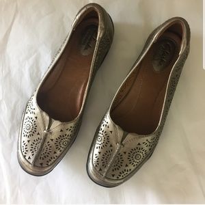 Clark's gold metallic flats